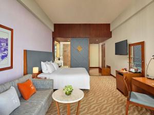 Postel nebo postele na pokoji v ubytování Novotel Nha Trang
