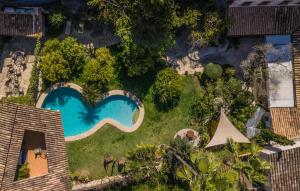 an overhead view of a swimming pool in a yard at Son Sant Jordi in Pollença
