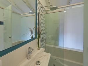 a bathroom with a sink and a shower at Son Sant Jordi in Pollença