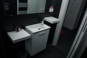 Un baño de Living Aparthotel