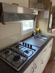 Cucina o angolo cottura di Chalet De Duinberg