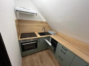 A kitchen or kitchenette at Talabér Vendégház