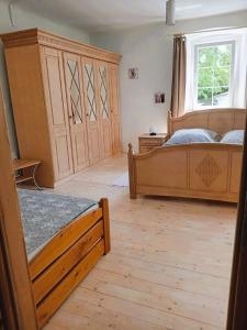 Llit o llits en una habitació de Nerezine CENTRUM apartmán pro 3 osoby