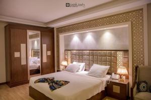 Ein Bett oder Betten in einem Zimmer der Unterkunft Nile Transportation hotel