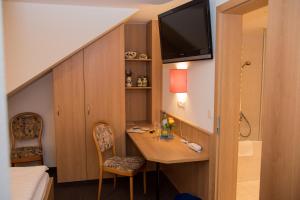 TV a/nebo společenská místnost v ubytování Hotel Park Eckersbach