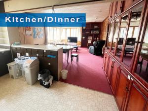 an office with a desk and a table in an office at Otaruya, Kitchen, Living Room, NETFLIX, 2 Rooms, Max 7PP, Free Parking in Otaru