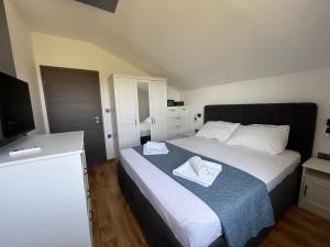 Postel nebo postele na pokoji v ubytování Apartment Zidaric