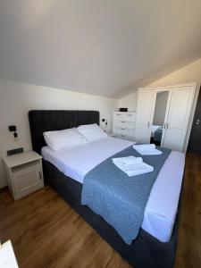 Postel nebo postele na pokoji v ubytování Apartment Zidaric