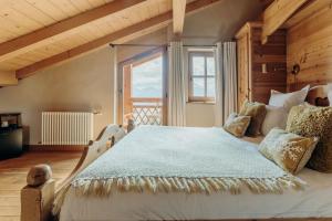 Postel nebo postele na pokoji v ubytování Le Chalet Hôtel Cordon Adults Only