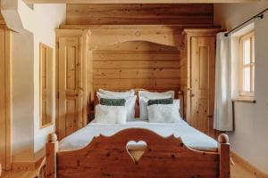 Postel nebo postele na pokoji v ubytování Le Chalet Hôtel Cordon Adults Only