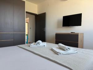 Postel nebo postele na pokoji v ubytování Apartment Zidaric