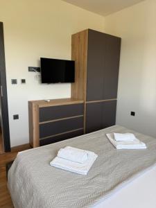 Postel nebo postele na pokoji v ubytování Apartment Zidaric