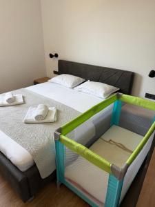 Postel nebo postele na pokoji v ubytování Apartment Zidaric