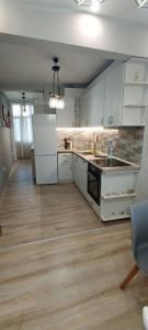 Kuchyň nebo kuchyňský kout v ubytování Apartment SEA HOLIDAYS