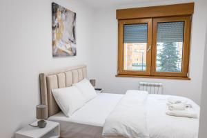 Una cama o camas en una habitación de Apartment N2 - A Blok