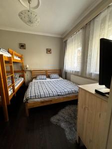 Ένα ή περισσότερα κρεβάτια σε δωμάτιο στο U Váhy Jáchymov