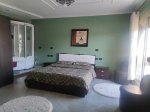 Voodi või voodid majutusasutuse Andi guest house toas