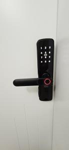 a remote control is attached to a wall at Bahr DELUX App & Suite in Ulcinj