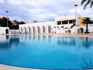Bazén v ubytování Duplex Hôtel Golden Carthage nebo v jeho okolí