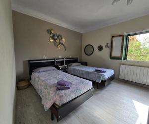 Postel nebo postele na pokoji v ubytování Mas Sara