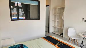 Postel nebo postele na pokoji v ubytování ADRI Hotel