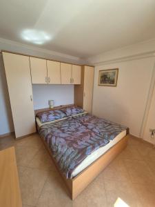 Postel nebo postele na pokoji v ubytování Apartmani Mira