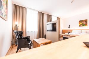 TV o dispositivi per l'intrattenimento presso Göttfried - essen trinken schlafen