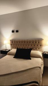 Postel nebo postele na pokoji v ubytování Caleta Design Departamento frente al mar