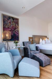 Postel nebo postele na pokoji v ubytování Hotel Villa Hügel