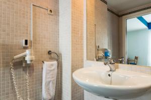 Kylpyhuone majoituspaikassa Villa De Pinto