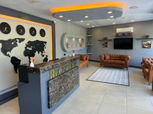 Μια τηλεόραση ή/και κέντρο ψυχαγωγίας στο Cim Suite Hotel +12 φωτογραφίες