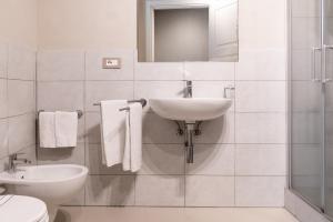 Koupelna v ubytování Hotel Baia di Talamone