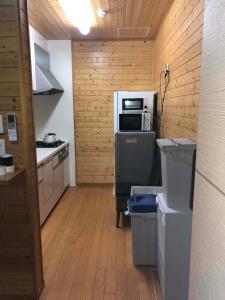 Kuchyň nebo kuchyňský kout v ubytování Guest House Wa N Wa 2