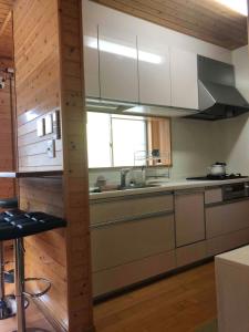 Kuchyň nebo kuchyňský kout v ubytování Guest House Wa N Wa 2 + 26 fotografií