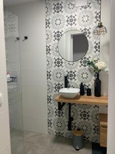 Ένα μπάνιο στο Apartamento Alpe Almagro