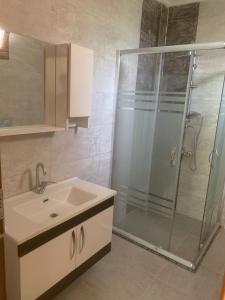 a bathroom with a shower and a sink at Su Apart in Rize +40 photos