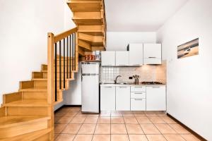 Küche/Küchenzeile in der Unterkunft Caorle Oasis Beach House - Host Solution