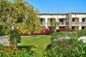 Ein Garten an der Unterkunft Caorle Oasis Beach House - Host Solution