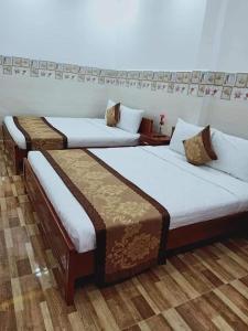 Postel nebo postele na pokoji v ubytování Sơn Tùng Motel