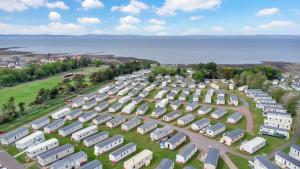 an aerial view of a parking lot with camper vans at Vacant Nests Seton Sands The Aberlady in Port Seton