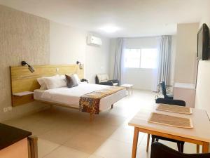 TV a/nebo společenská místnost v ubytování Résidences Les Hauts de l'Indenié