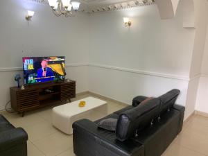 TV a/nebo společenská místnost v ubytování cosy chez Gaby
