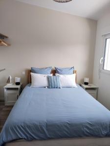 Postel nebo postele na pokoji v ubytování LENIE appartement reposant