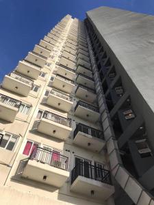 a tall building with balconies on the side of it at Cityscape Grand Tower Condo, studio unit in Cebu City