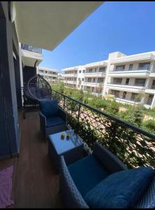 Balkón nebo terasa v ubytování Appartement avec piscine à El Mansouria + 2 fotografie