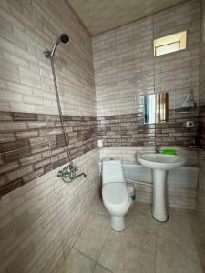 Koupelna v ubytování Гостевой дом при кафе оазис