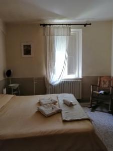 Postel nebo postele na pokoji v ubytování Bed and Breakfast Evelina