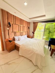 Katil atau katil-katil dalam bilik di Crest View Hotel