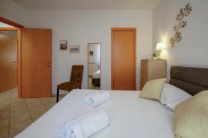Ένα ή περισσότερα κρεβάτια σε δωμάτιο στο MyDreamCastelnuovo Parking free +19 φωτογραφίες