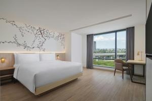 Postel nebo postele na pokoji v ubytování Fairfield by Marriott Bekasi